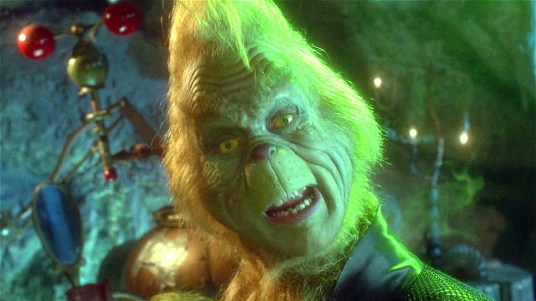 Live-action Grinch making face