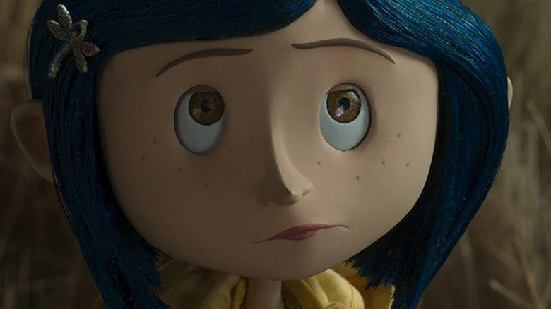 Coraline smirking 