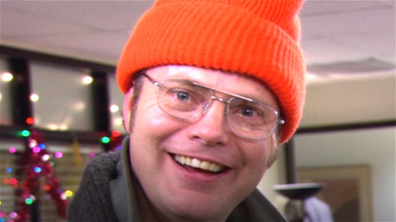 Dwight bringing in the tree