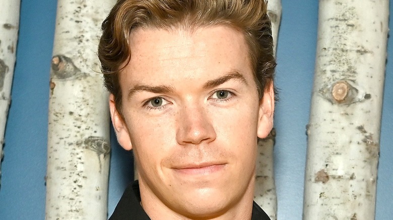 Will Poulter smiling