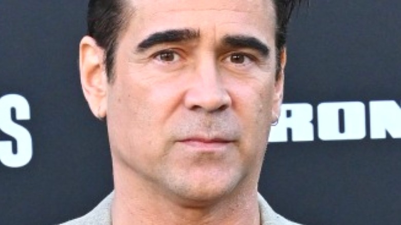 Colin Farrell posing for red carpet pictures