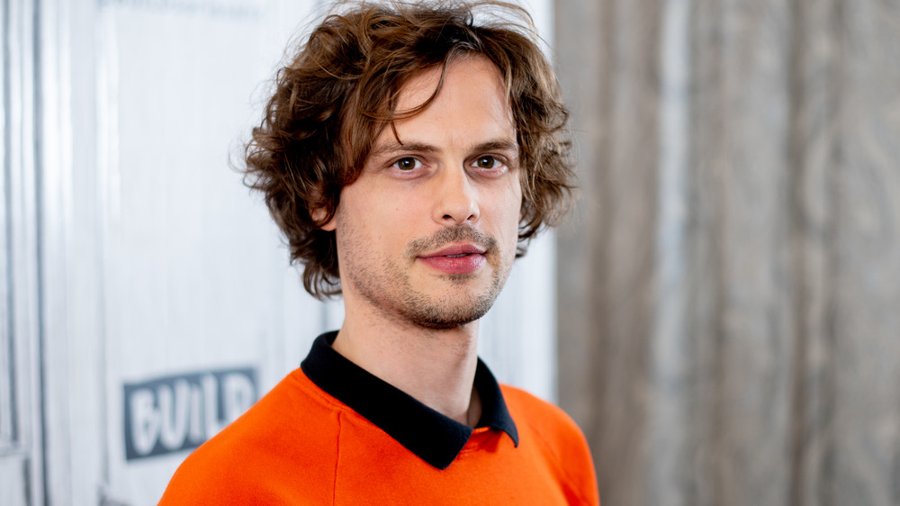 Matthew Gray Gubler orange sweater