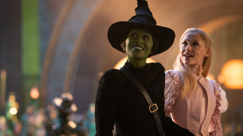 Elphaba and Glinda walking through the Emerald City