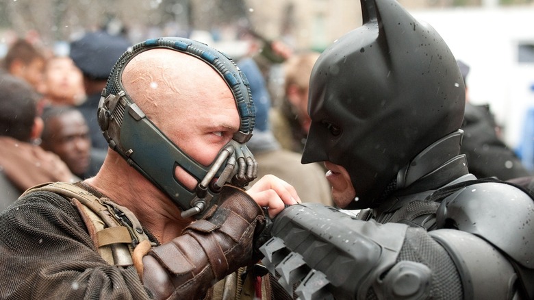 Bane and Batman getting up close and personal in their fight in "The Dark Knight Rises" (2012)