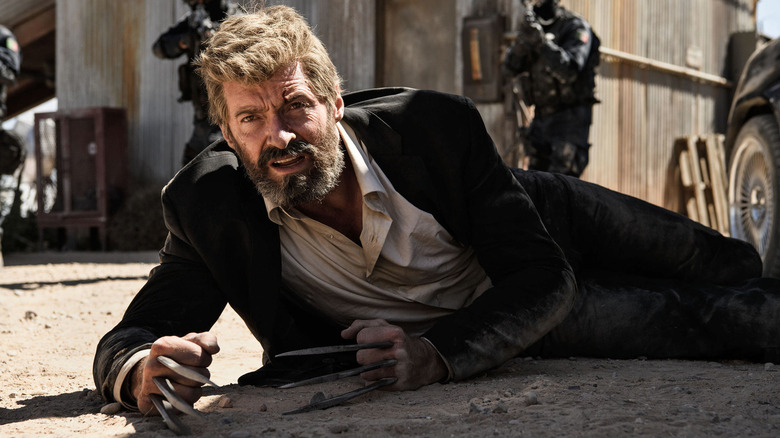 An injured Logan on the ground in "Logan" (2017)