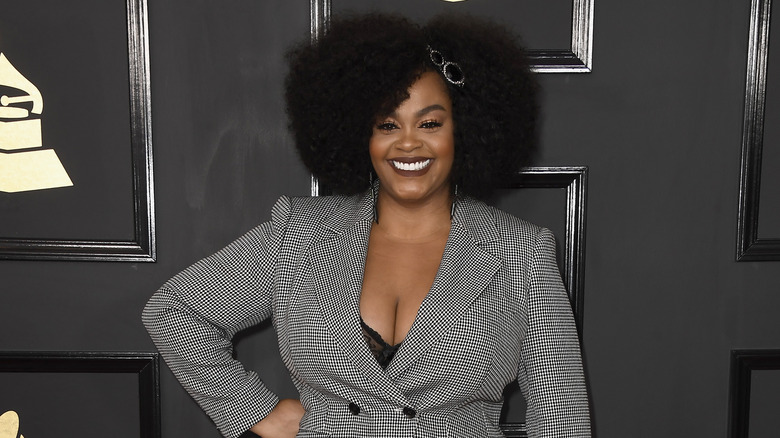 Jill Scott wearing houndstooth blazer