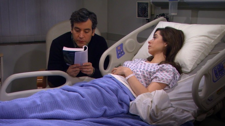 Ted reads to Tracy in hospital bed 