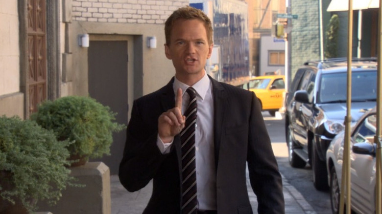 Barney Stinson choosing the suit over the girl