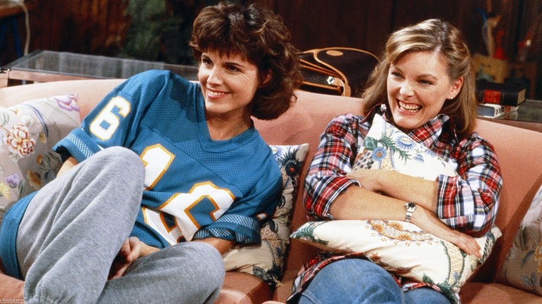 Kate and Allie laughing on the couch in "Kate & Allie" (1984)