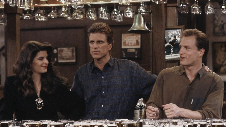 Rebecca, Sam, and Woody sitting at the bar together  in "Cheers"