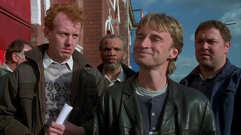 Full Monty characters standing outside