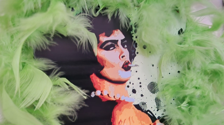 Tim Curry on Rocky Horror Picture Show poster