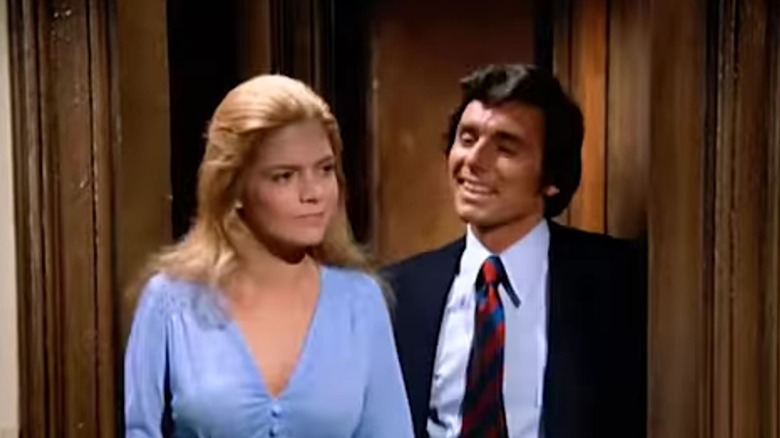 Meredith Baxter as Bridget and David Birney as Bernie, walking through a doorway together on Bridget Loves Bernie