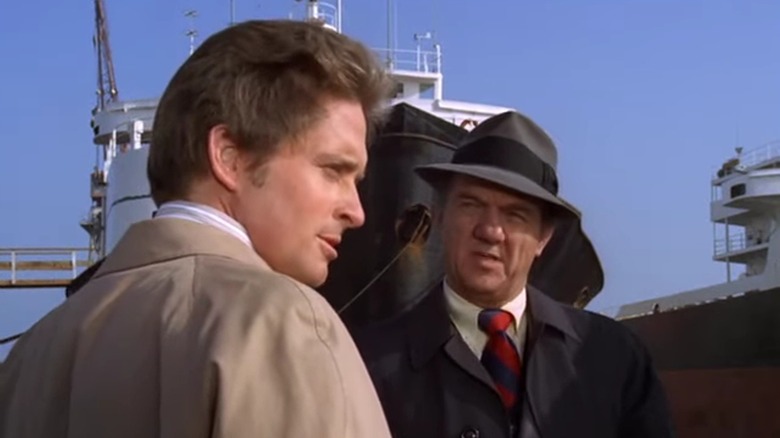 Michael Douglas as Steve Keller and Karl Malden as Mike Stone, in front of a yacht on The Streets of San Francisco