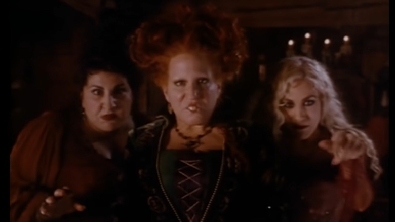 Sanderson sisters standing in the dark
