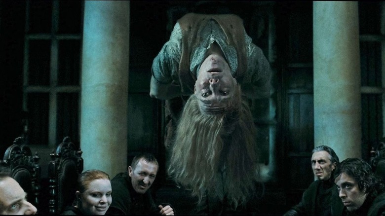 Charity Burbage floating upside-down