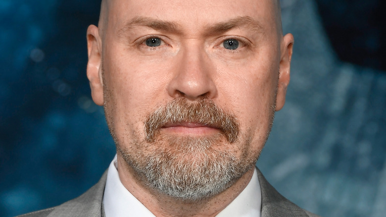 Steven S. DeKnight scowling