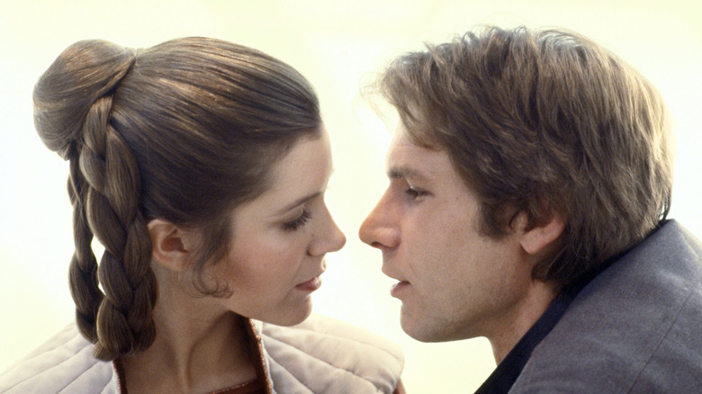Han and Leia going in for a kiss in "The Empire Strikes Back" (1980)
