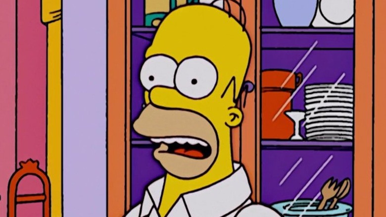 Homer Simpson mouth open explaining himself