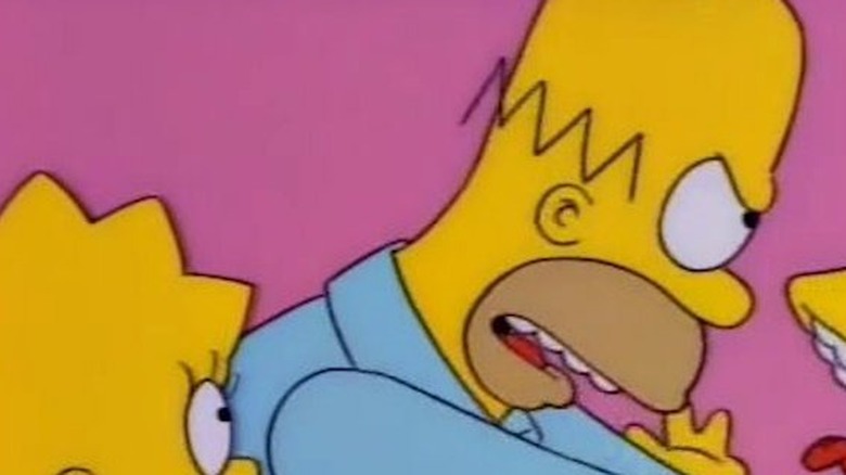 Homer Simpson chokes Bart while Lisa watches