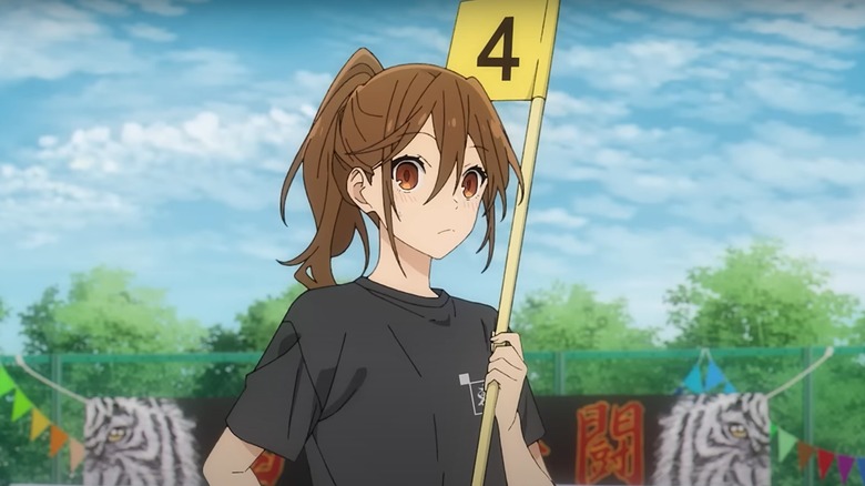 Hori holding a flag