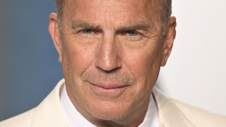 Kevin Costner smiling at event