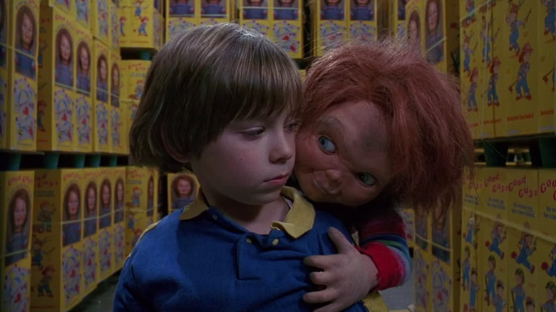 Chucky holding Andy hostage in the toy factory