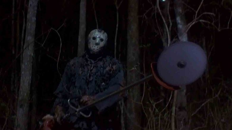 Jason holding a weed whacker