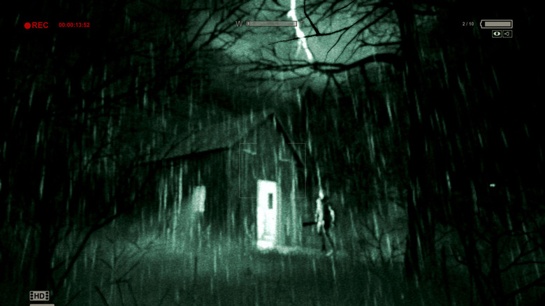 A man walks in the rain