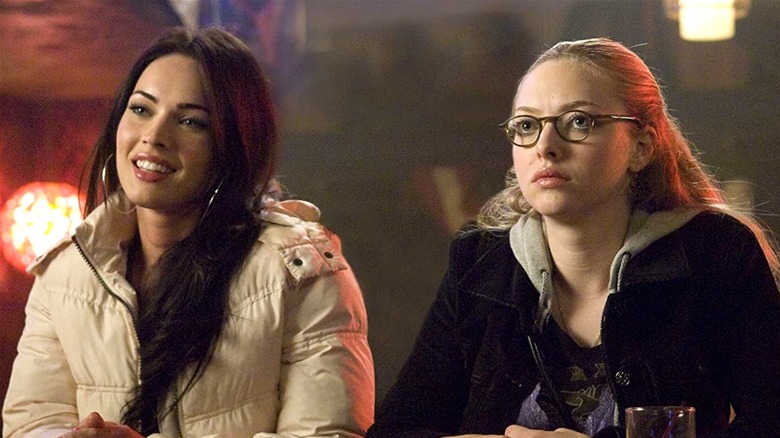 Jennifer and Needy sitting side by side in Jennifer's Body (2009)