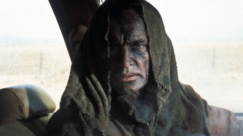 Jesse Hooker driving a car in Near Dark (1987)