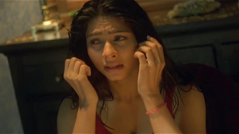 Mehak looking around scared in "Ssshhh..." (2003)