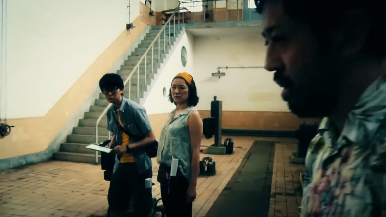 A filmmaker by the camera in One Cut of the Dead