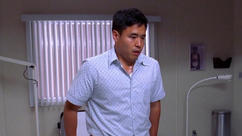 Patient Brad stands in an exam room on House MD (2004 - 2012)