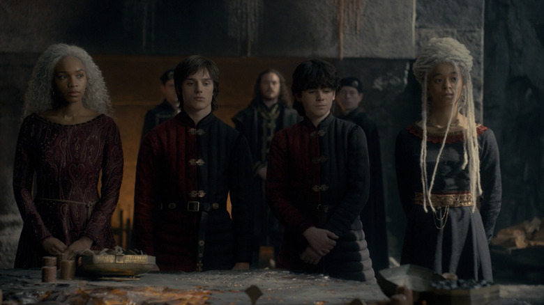 Rhaena Targaryen standing beside  Lucerys Velaryon