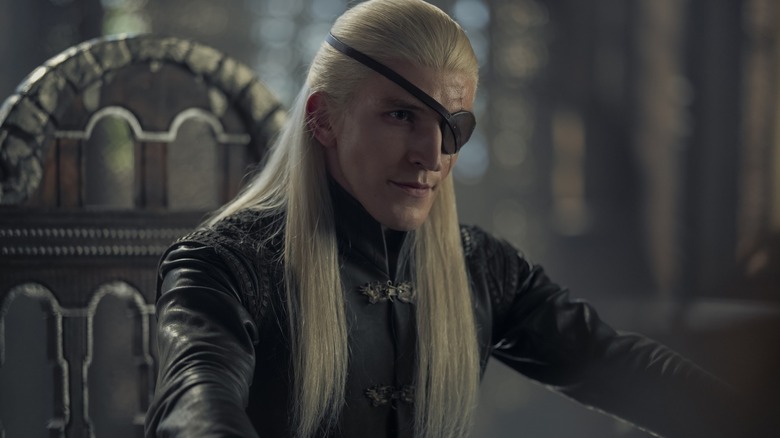 Aemond sitting with his eyepatch on House of the Dragon