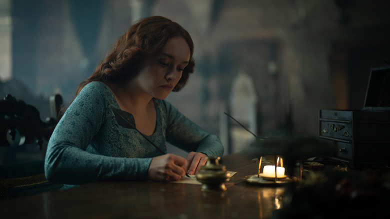Alicent writing a letter on House of the Dragon