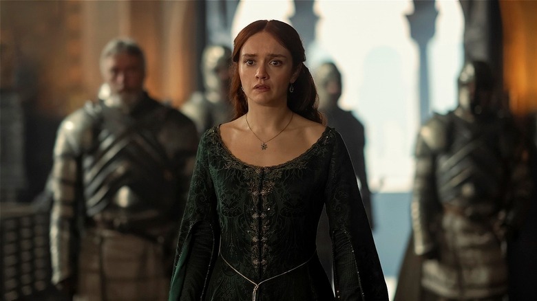 Alicent looking alarmed with knights behind her on House of the Dragon