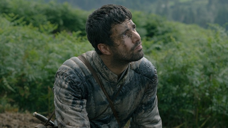 Ser Criston Cole looking up with a serious expression on "House of the Dragon" (2022-present)