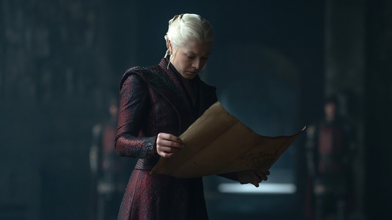 Rhaenyra Targaryen reading a document in House of the Dragon Season 3