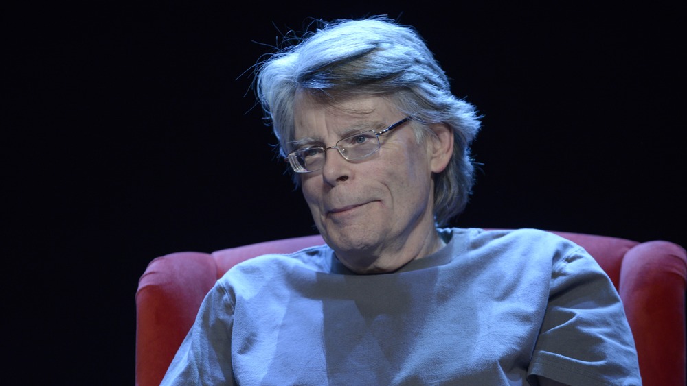 Stephen King smiles