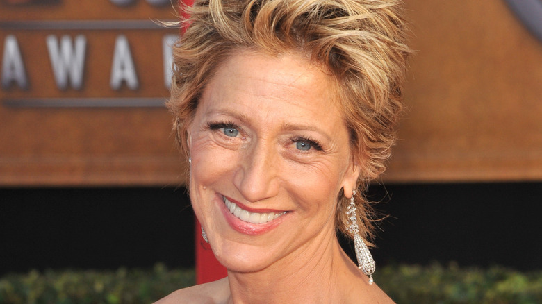 Edie Falco grins