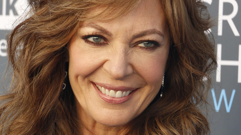 Allison Janney smiles at a movie premiere