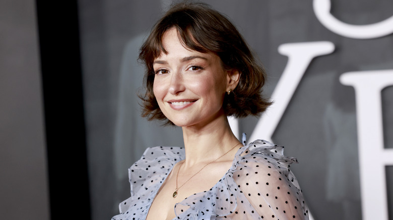 Milana Vayntrub smiling on the red carpet