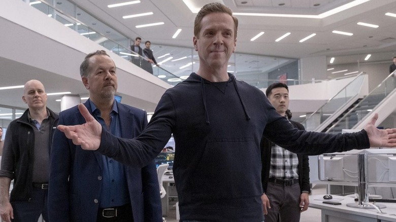Axe standing with his arms out