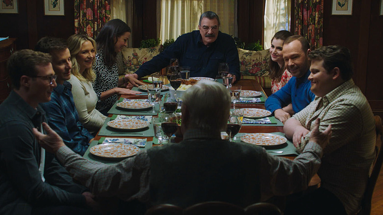 Frank Reagan at head of table