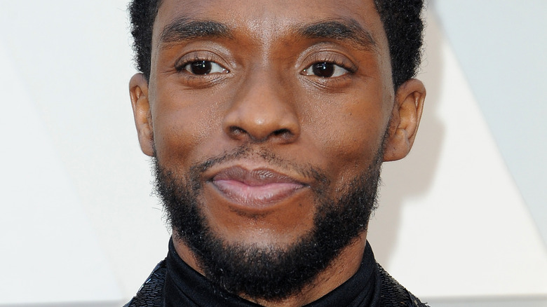 Chadwick Boseman smiling at an awards show in 2018