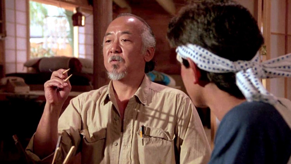 Pat Morita and Ralph Macchio in The Karate Kid