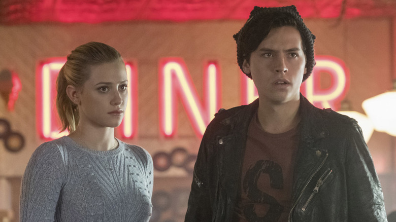 Betty and Jughead looking worried