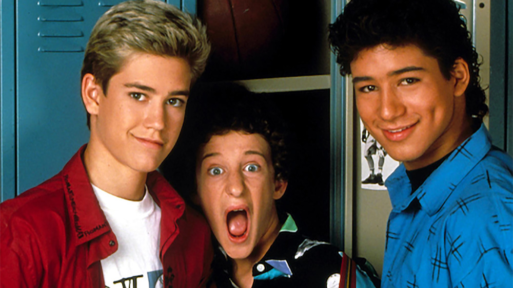 Saved by the Bell stars in front of locker